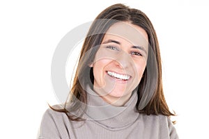 Portrait of young smiling happy woman looks in camera