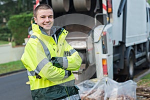 Portrait young smiling refuse collector