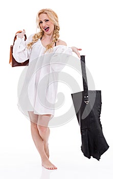 Portrait of young stunning woman in black minidress