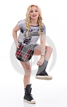 Portrait of young stunning woman in black minidress