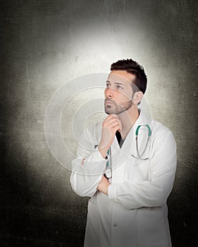 Portrait Of Young Thoughtful Male Doctor