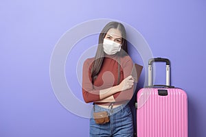 Portrait of young traveler woman with face mask , New normal travel concept