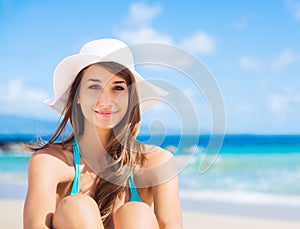 Portrait of young woman at the beach