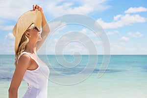 Portrait of young woman on the beach