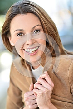 Portrait of young woman being happy