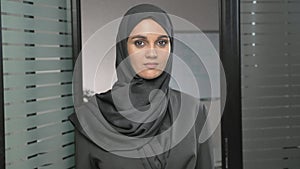 Portrait of Young woman in black hijab showing stop sign, Dislike, Rejecting Gesture, Disagree Sign 60 fps
