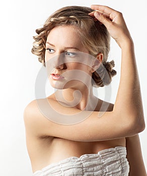 Portrait of young woman with braid hairdo