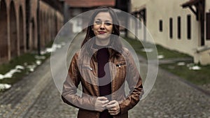 Woman in brown leather jacket photo