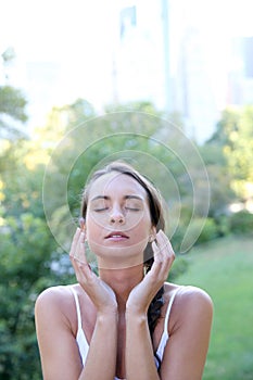 Portrait of young woman in central park