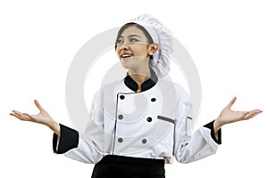 Portrait of young woman chef on white background