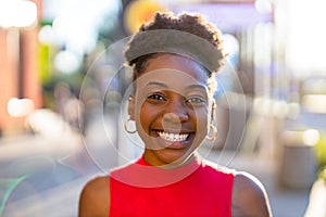 Portrait of young woman in the city