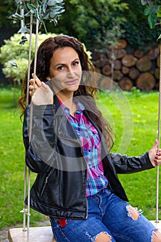 Portrait of a young woman with dark long hair.