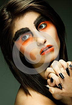 Portrait young woman in depression. Creative make-up.