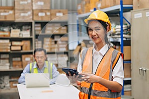 Portrait young woman engineer happy working inventory staff. Southeast Asian teen lady worker standing in factory products