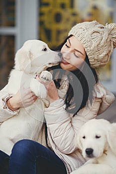 Portrait of the young woman with favourite dogs