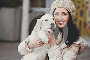 Portrait of the young woman with favourite dogs