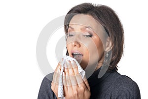 Portrait of young woman feels sick on white background