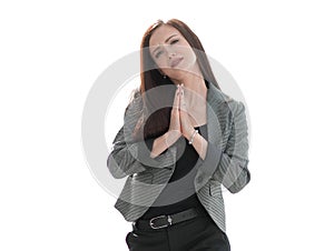 Portrait of a young woman gesticulating with her hands folded, please forgive.