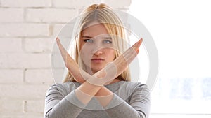 Portrait of Young Woman Gesturing Rejection, Refusal