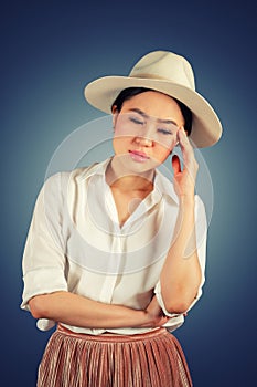 Portrait young woman having headache
