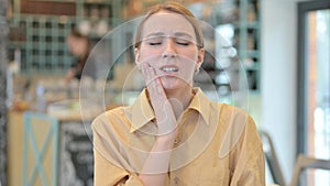 Portrait of Young Woman having Toothache, Pain in Tooth