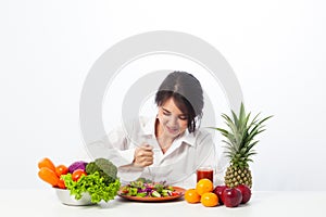 Portrait young woman healthy diet eating salad food.