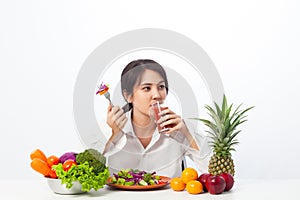 Portrait young woman healthy diet eating salad food.