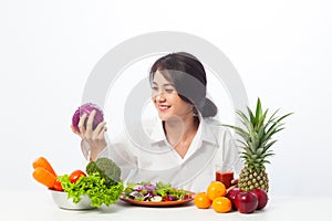 Portrait young woman healthy diet eating salad food.