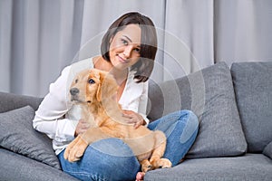 Portrait of young woman with her dog