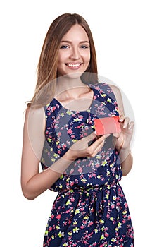 Portrait of young woman holding empty credit card