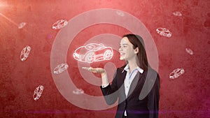 Portrait of young woman holding painted cartoon car on the open hand palm, drawn studio background. Business concept.