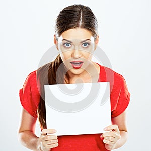 Portrait of young woman holding sign card