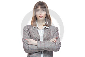 Portrait of a young woman in a jacket. Concept of a successful young business lady. Isolated on white background.