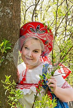 Portrait of young woman in kokoshnik