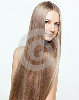 Portrait of young woman with long hair