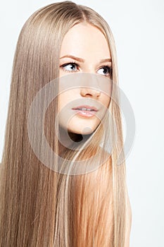 Portrait of young woman with long hair