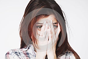 Portrait of a young woman looking in fear Gestures, body langua