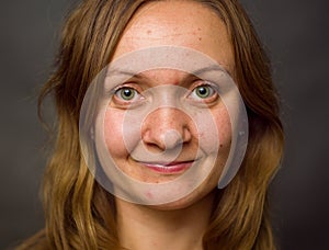 Portrait of young woman, no make up, brown dark hair, no retouch making expressions.