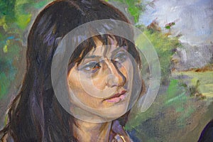 Portrait of a young woman painted in oil