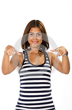 Portrait of young woman pointing with both hands towards you