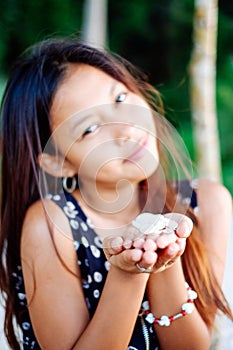 Portrait of a young woman with positive attitude smiling