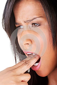Portrait of young woman provoke vomiting