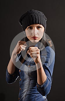 Portrait of young woman ready to fight