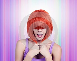 Portrait young woman with red hair and bang covering her eyes