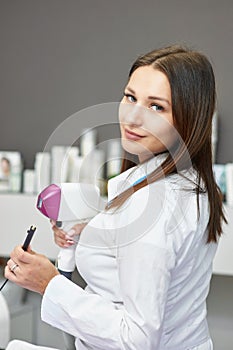 Portrait of a young woman in a salon.
