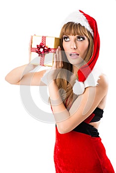 Portrait of young, woman Santa with gift boxes