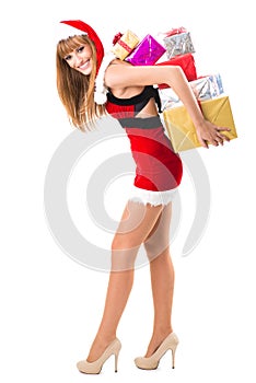 Portrait of young, woman Santa with gift boxes