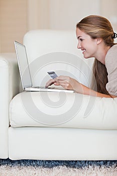 Portrait of a young woman shopping online