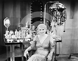 Portrait of a young woman sitting in a beauty salon