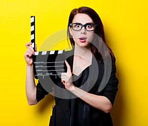 Portrait of the young woman with slapstick photo